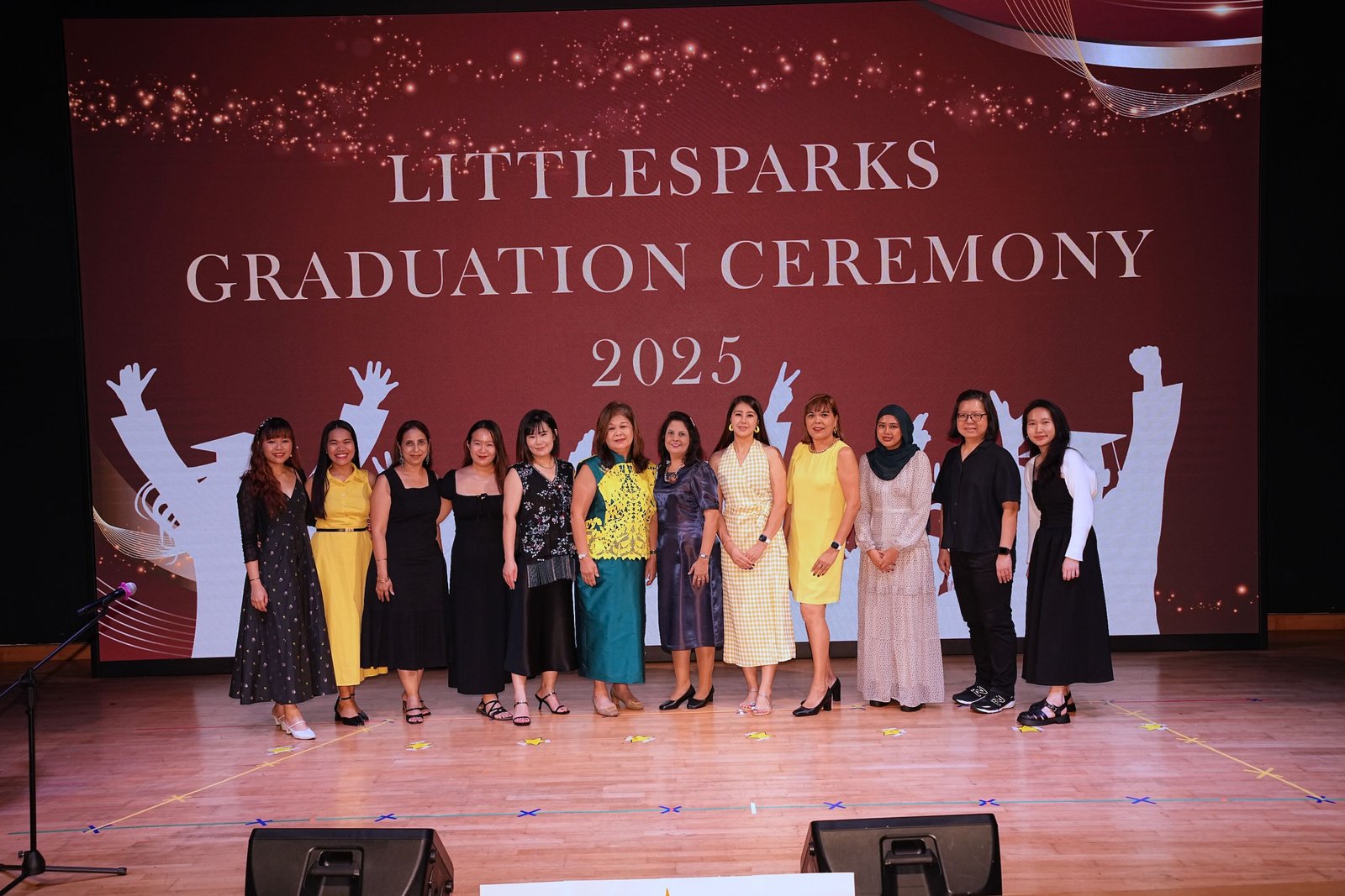 LittleSparks Graduation Ceremony 2025 — the teaching team on stage